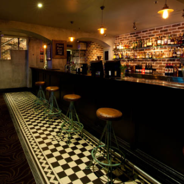 Canalside Interiors' Torque Industrial Stool as seen at 80 Proof