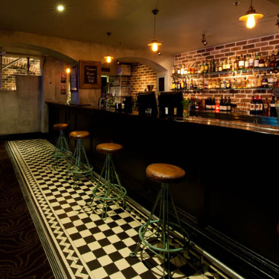 Canalside Interiors' Torque Industrial Stool as seen at 80 Proof