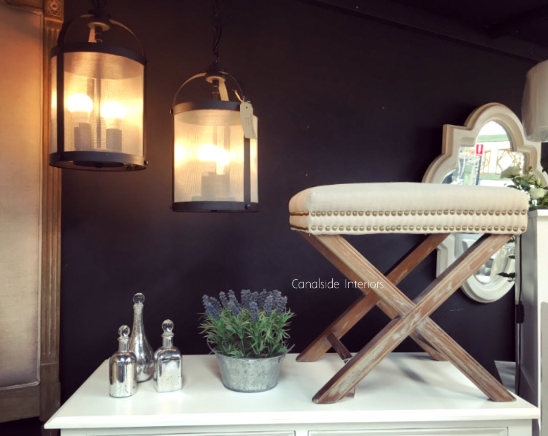 Cream Ottoman with X-Base and Studded Detailing