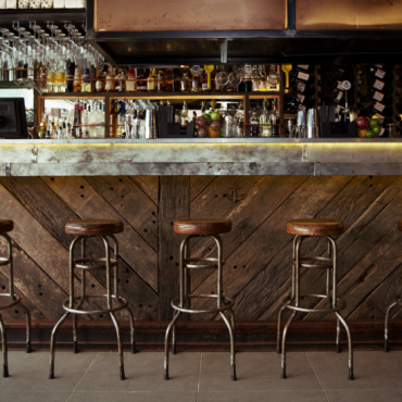 Canalside Interiors' Buck Industrial Stool as featured at Seawall Bar & Restaurant Image C/- seawallrestaurant.com.au