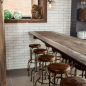Canalside Interiors' Buck Industrial Stool as featured at Seawall Bar & Restaurant Image C/- seawallrestaurant.com.au