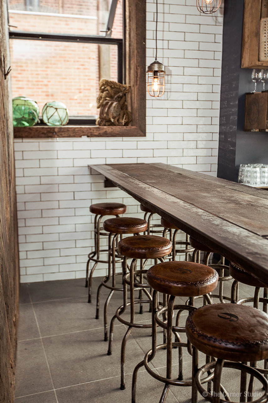 Canalside Interiors' Stag Industrial Stool as featured at Seawall Bar & Restaurant
Image C/- seawallrestaurant.com.au